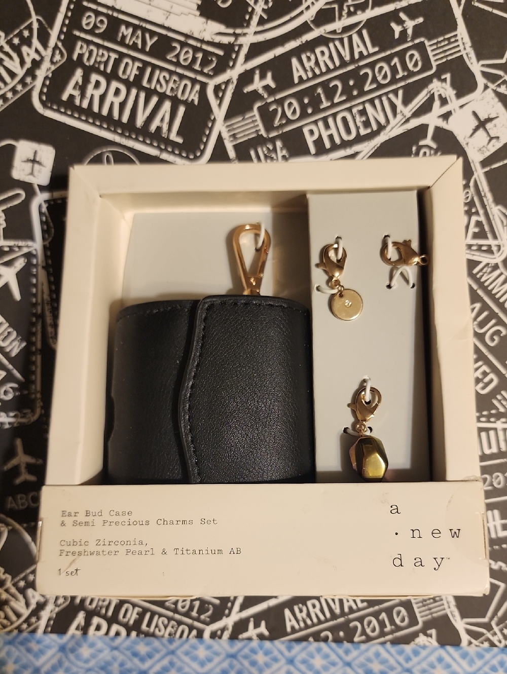 a new day Black Earbud Case with Gold Charm Set